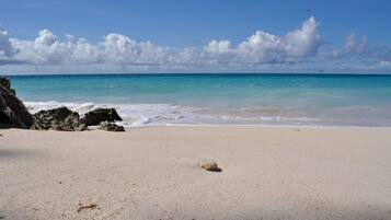 Beach nearby, white sand, snorkelling, windsurfing