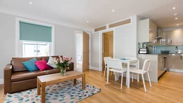 Luxury Apartment, 2 Bedrooms | Living room | Flat-screen TV