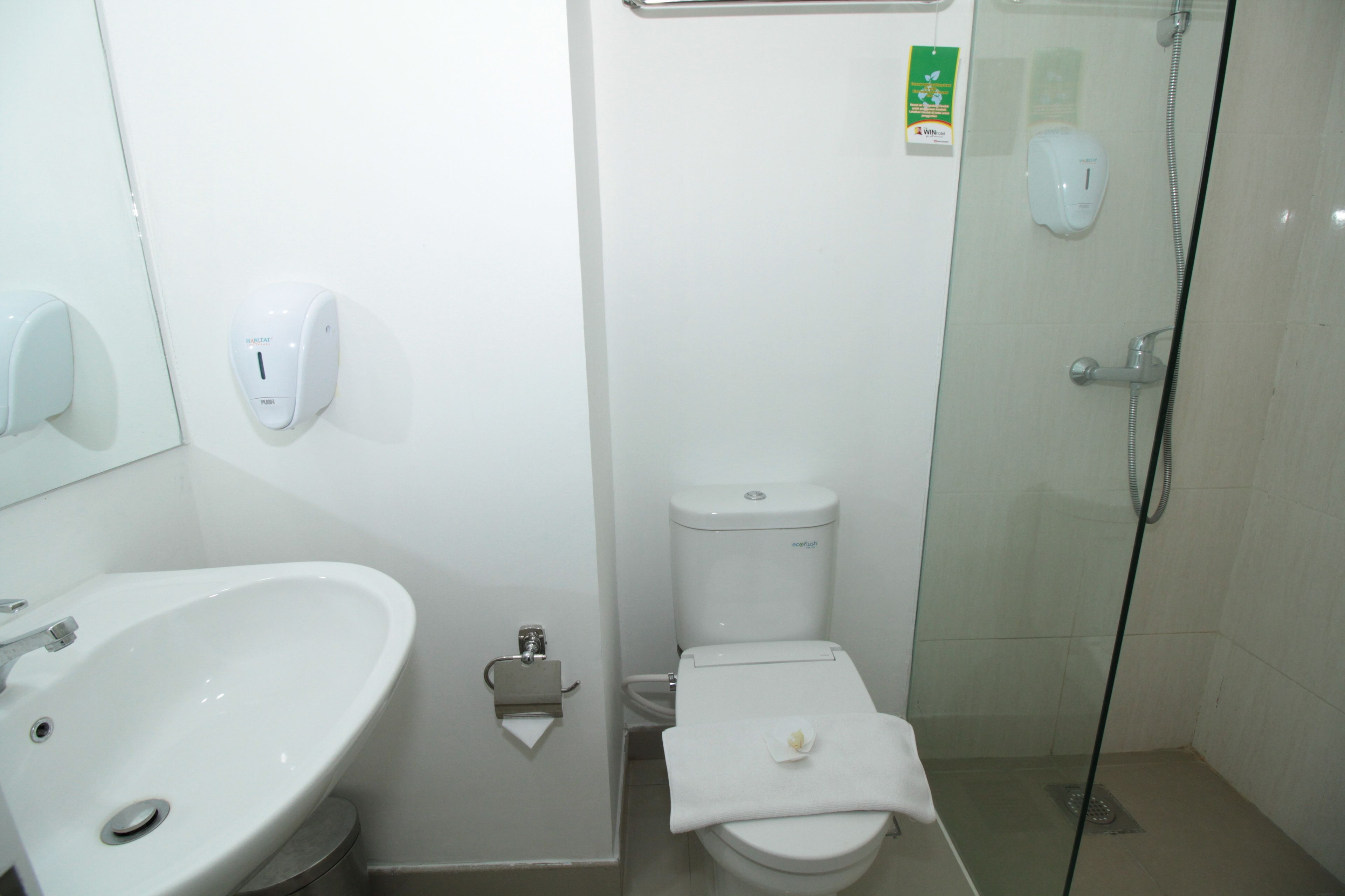 shower, free toiletries, slippers, towels