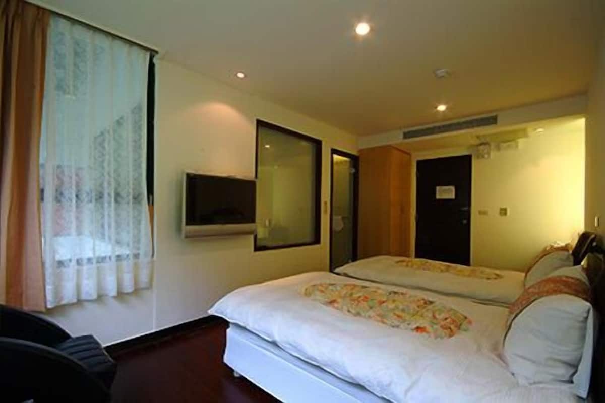 Chambre avec lits jumeaux