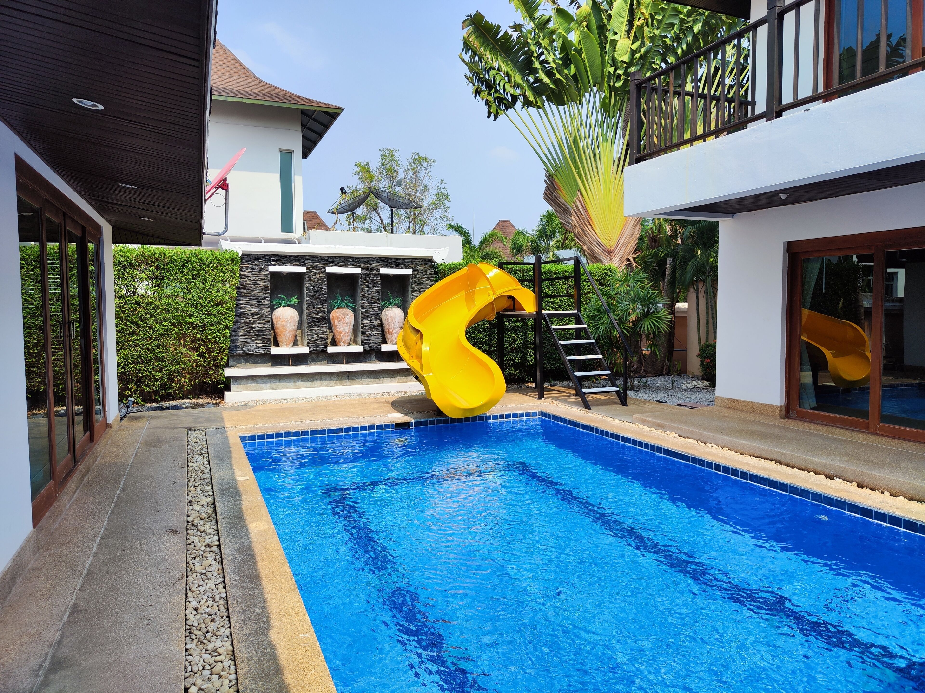Outdoor pool, pool umbrellas, pool loungers