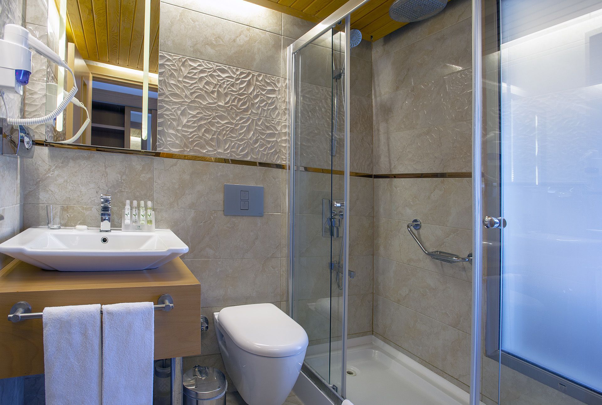 family room | bathroom | shower, hair dryer, slippers, towels