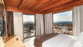 Habitación doble, Terraza | Ropa de cama de alta calidad y minibar