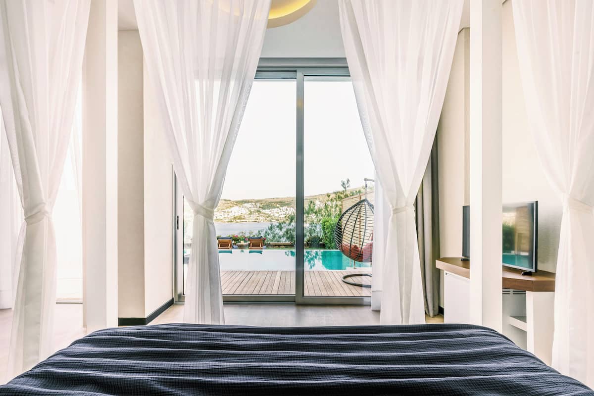 4 slaapkamers, luxe beddengoed, een minibar, een kluis op de kamer