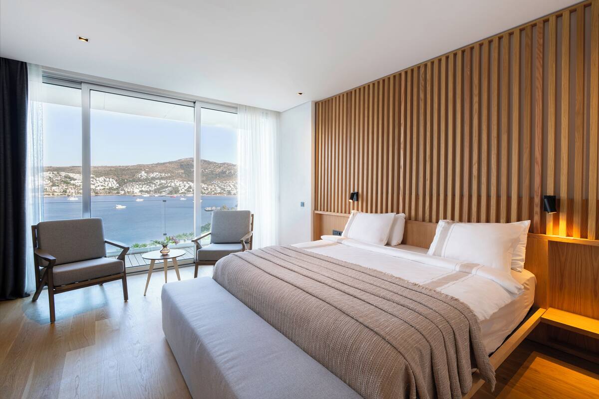 Suite, 2 Bedrooms, Sea View | Premium bedding, minibar, in-room safe, desk