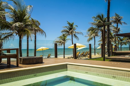 On the beach, sun loungers, beach umbrellas, beach towels