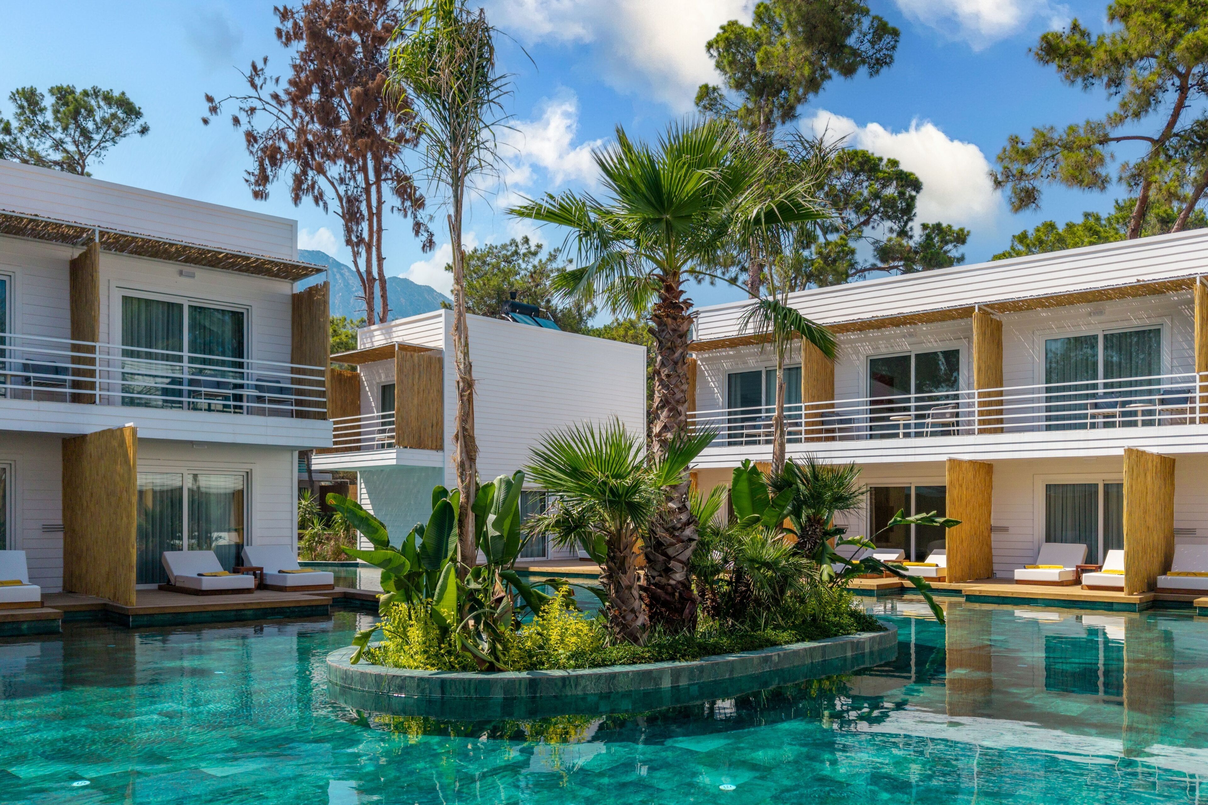 Indoor pool, 8 outdoor pools, open 8:00 AM to 6:00 PM, pool umbrellas