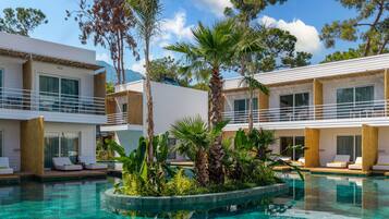 Indoor pool, 8 outdoor pools, open 8:00 AM to 6:00 PM, pool umbrellas