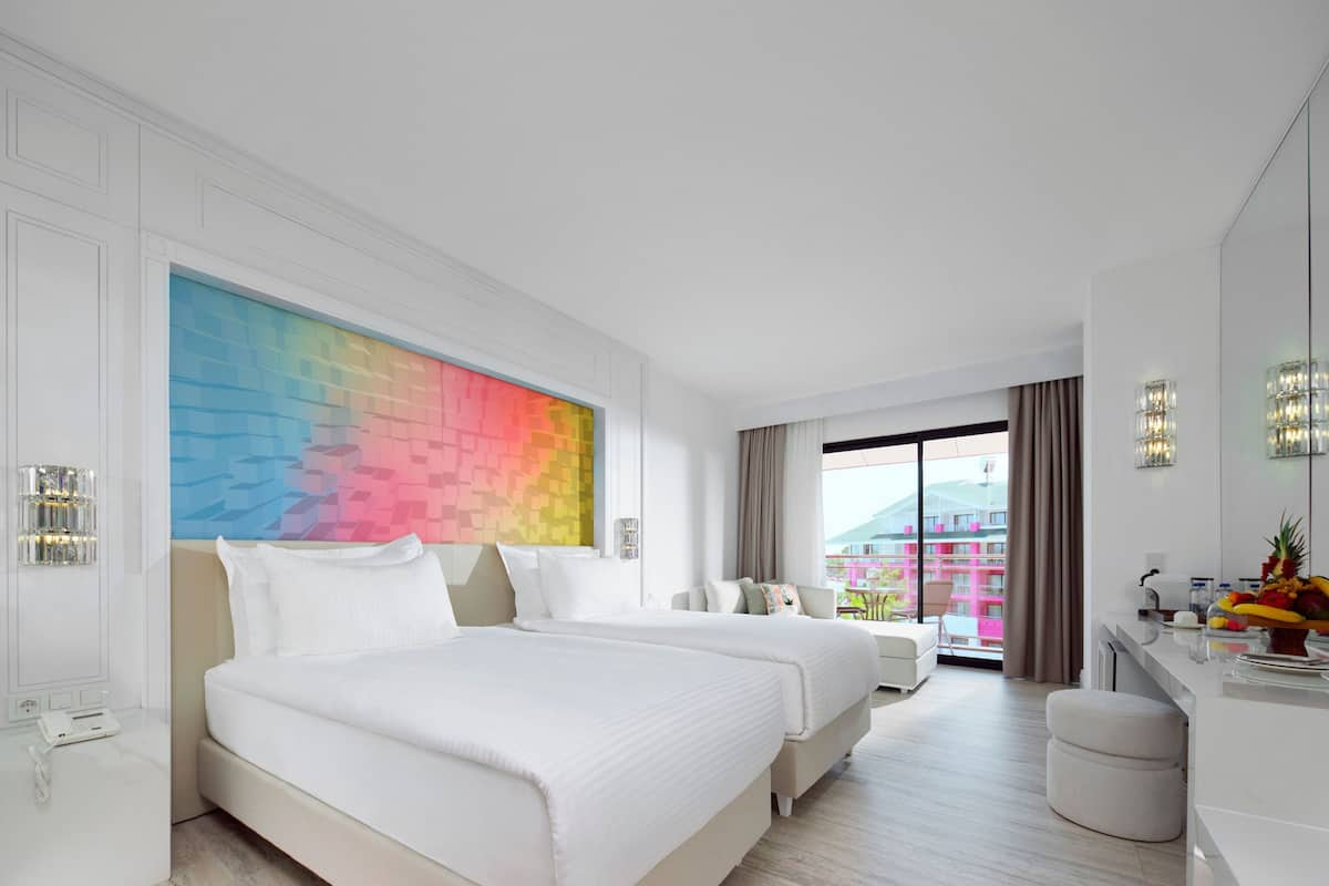 Premium bedding, free minibar items, in-room safe, desk