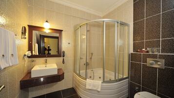 Shower, free toiletries, hair dryer, slippers