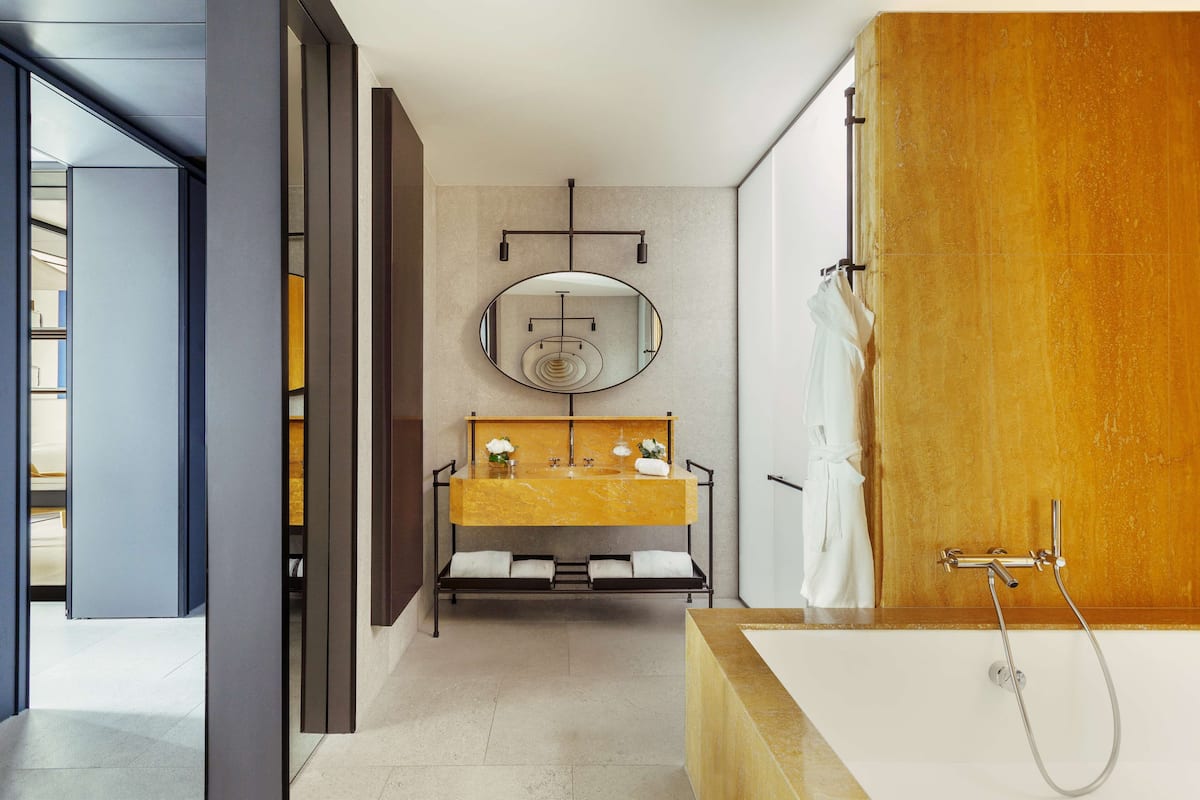 hair dryer, bathrobes, towels, soap