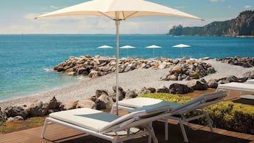 Private beach, sun loungers, beach umbrellas, beach towels