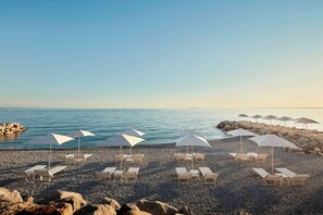 Private beach, sun loungers, beach umbrellas, beach towels
