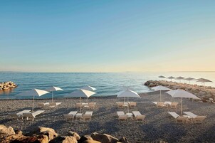 Private beach, sun loungers, beach umbrellas, beach towels