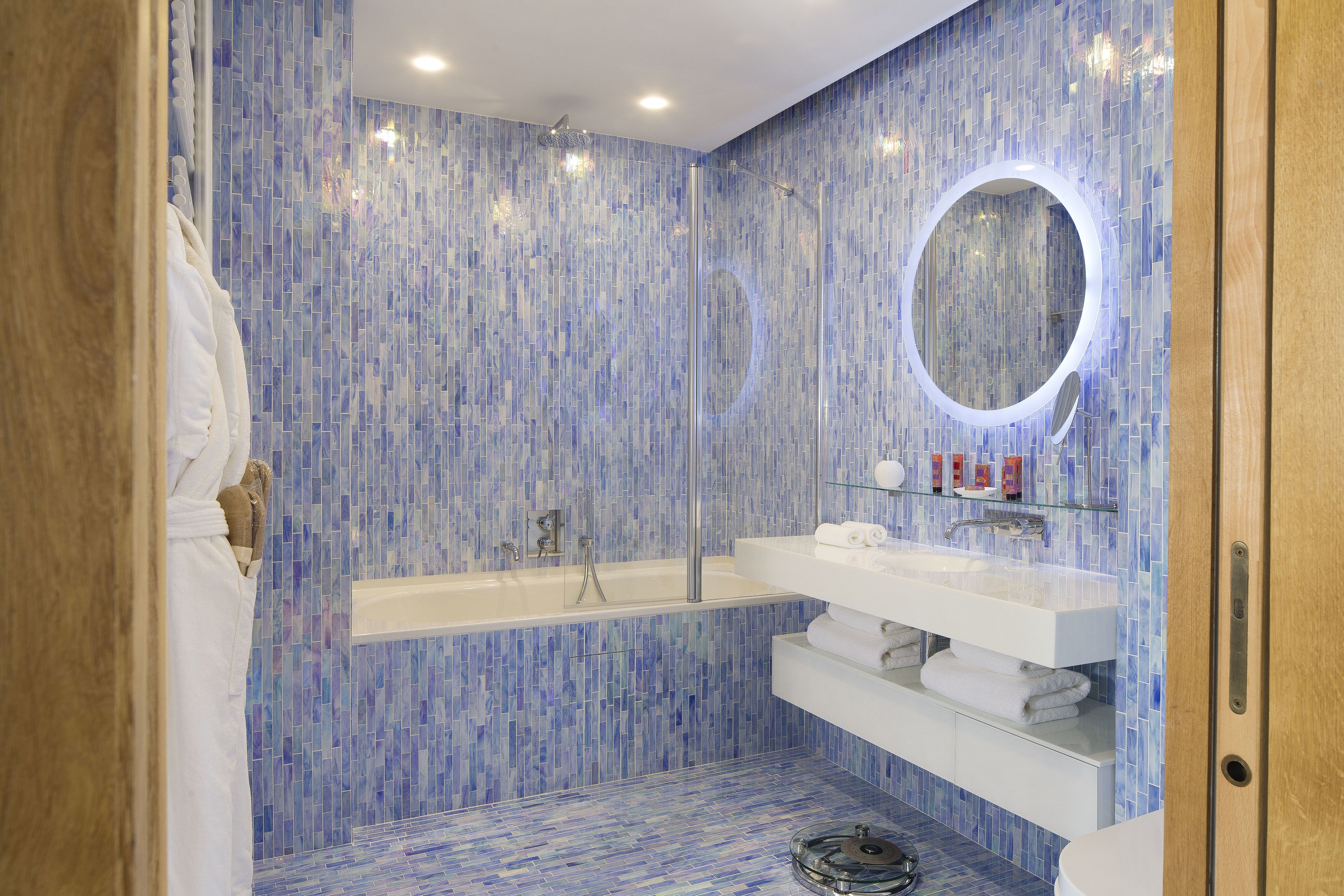 free toiletries, hair dryer, towels, toilet paper