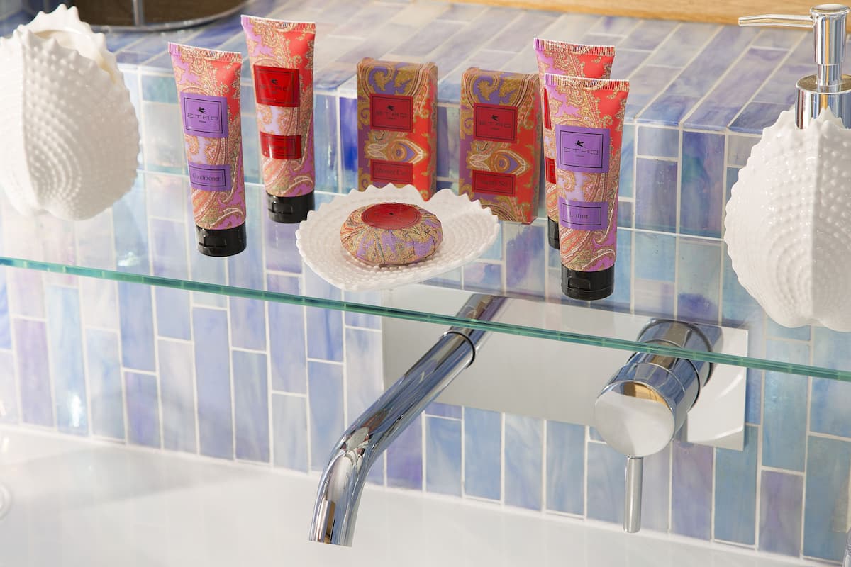 free toiletries, hair dryer, towels, toilet paper