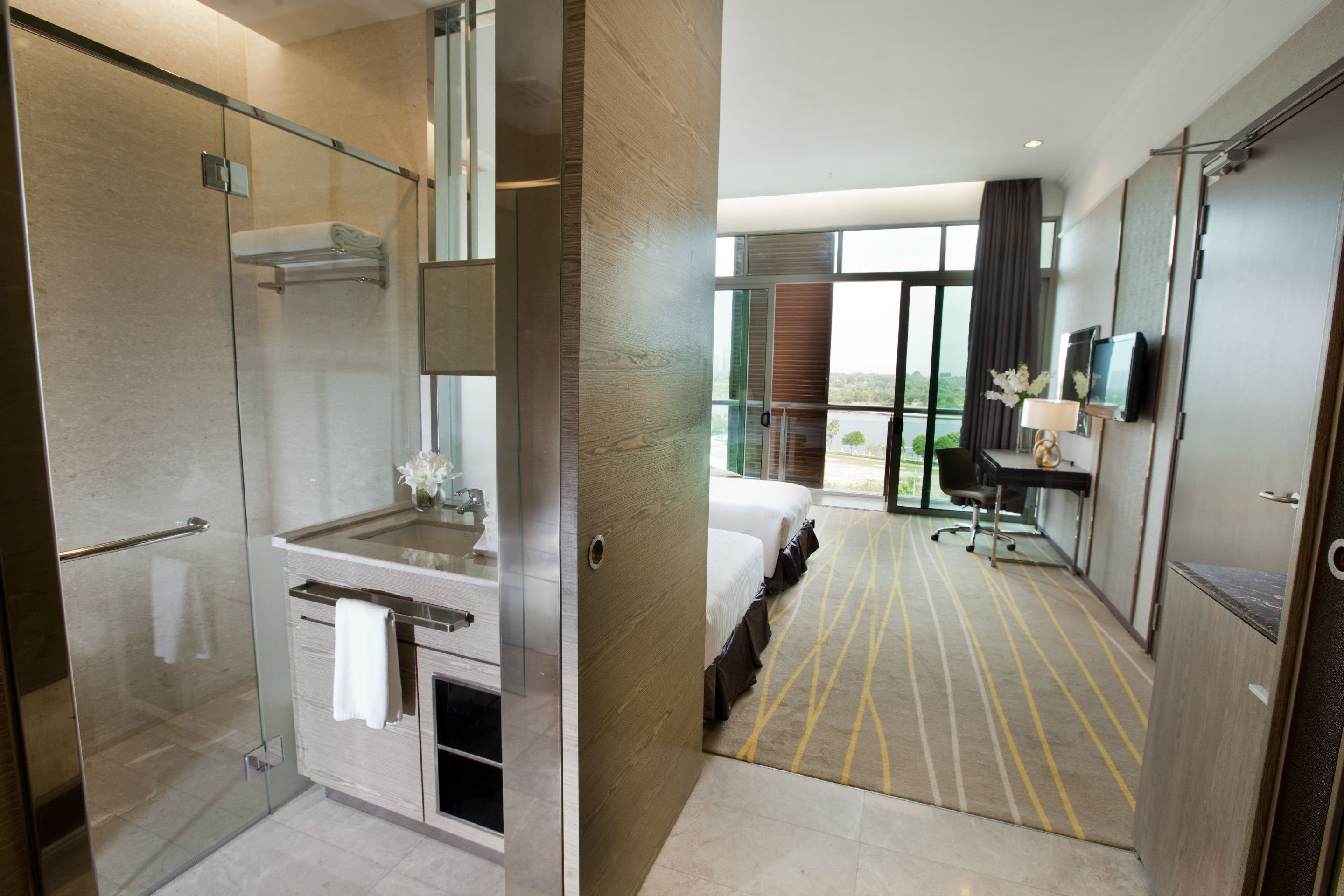 deluxe room, balcony | minibar, in-room safe, desk, laptop workspace