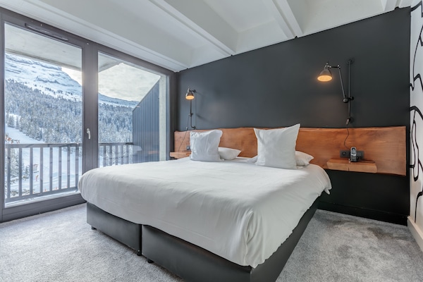 Luxe beddengoed, een kluis op de kamer, een bureau