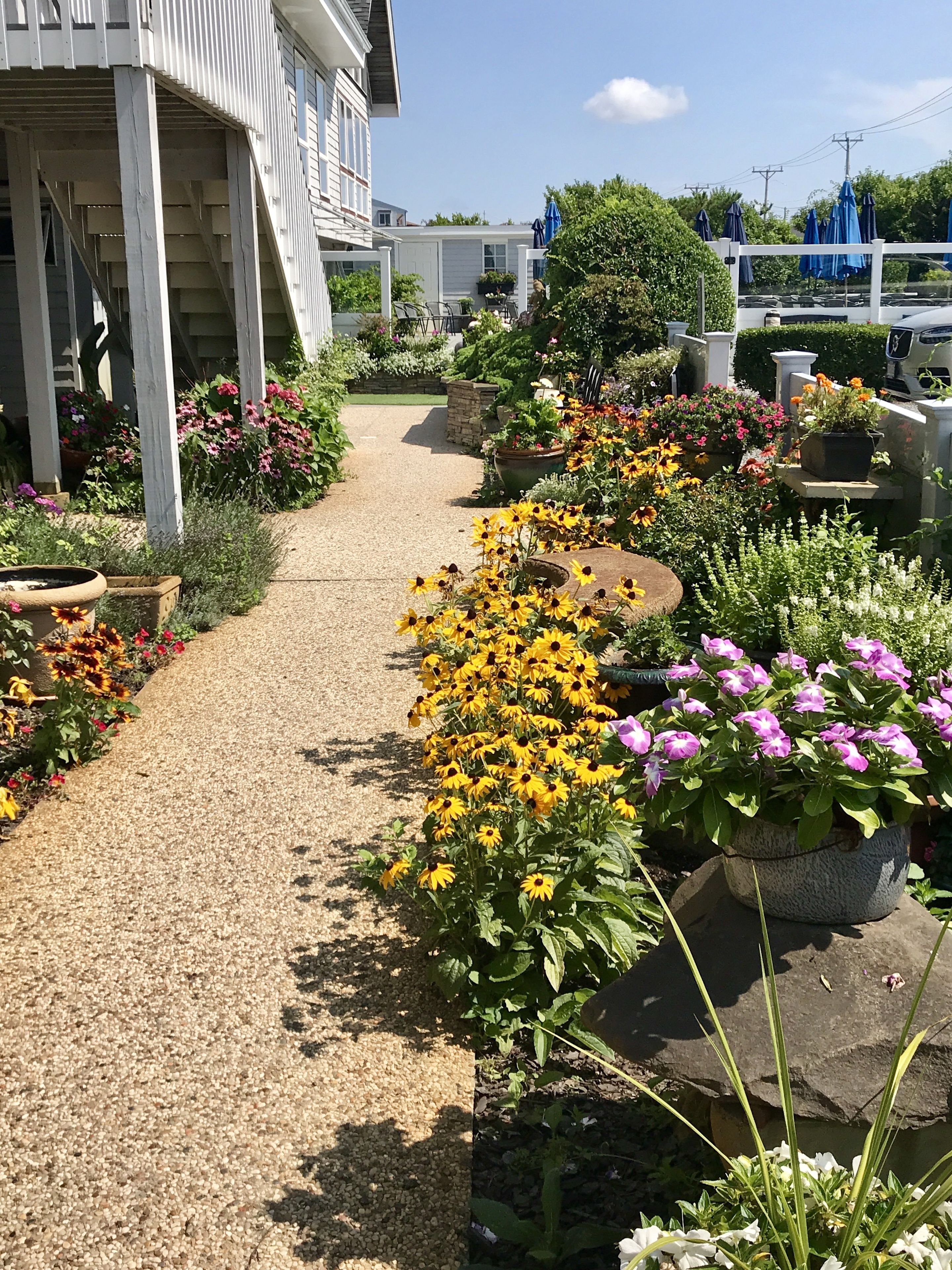 Zimmer, 2 Queen-Betten, Gartenblick | Blick auf den Garten