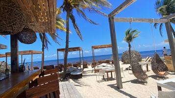 Private beach nearby, white sand, beach umbrellas, beach bar