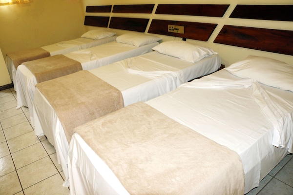 Standard Quadruple Room | Minibar, iron/ironing board, free WiFi