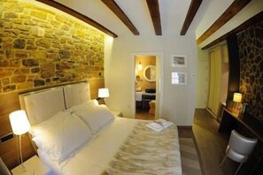 Free minibar, in-room safe, desk, blackout curtains