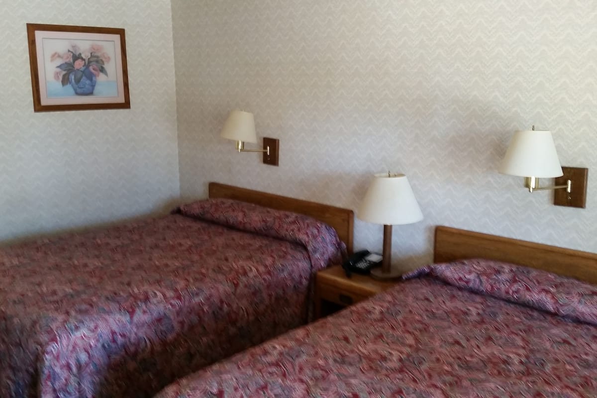 Room, 2 Queen Beds | Desk, blackout drapes, iron/ironing board (on request), WiFi (free)