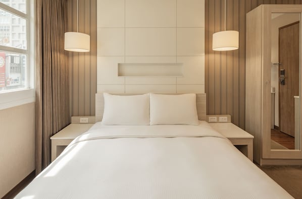 Down comforters, desk, blackout drapes, soundproofing