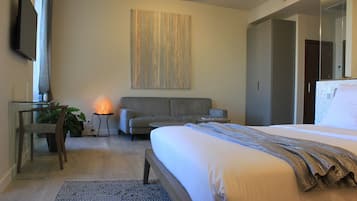 Suite Deluxe | 1 habitación, minibar y caja de seguridad en la habitación