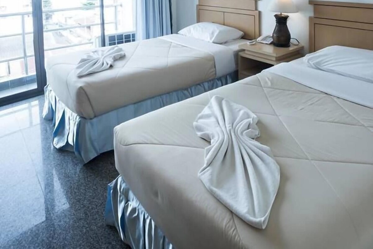 Blackout curtains, rollaway beds, free WiFi