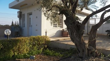 Suíte, banheiro privativo | Terraço/pátio
