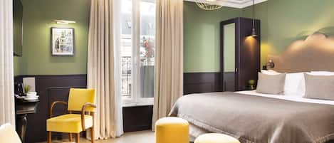 Habitació Deluxe | Roba de llit d'alta qualitat, minibar i caixa forta a l'habitació