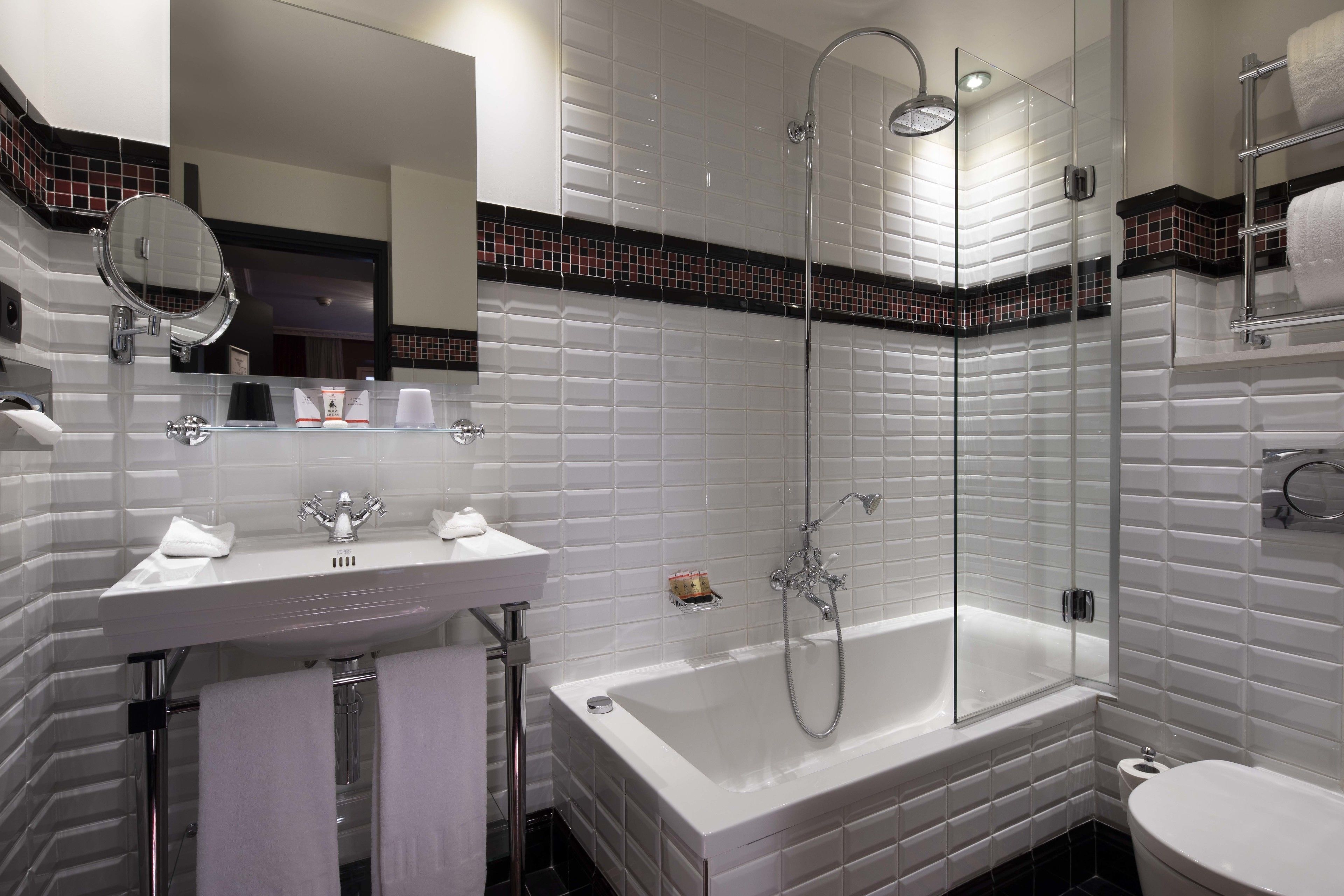 superior double room | bathroom | shower, hydromassage showerhead, designer toiletries, hair dryer