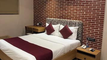 Suite | Copriletto in piuma, una cassaforte in camera, postazione laptop