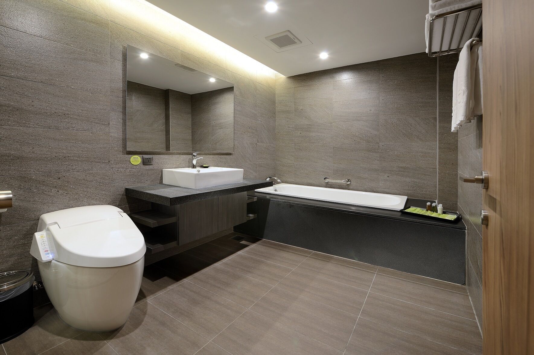 deluxe quadruple room | bathroom | shower, free toiletries, hair dryer, slippers