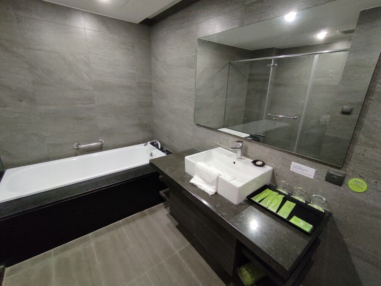 deluxe triple room | bathroom | shower, free toiletries, hair dryer, slippers