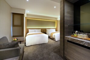 Standard Quadruple Room | Minibar, in-room safe, desk, free WiFi