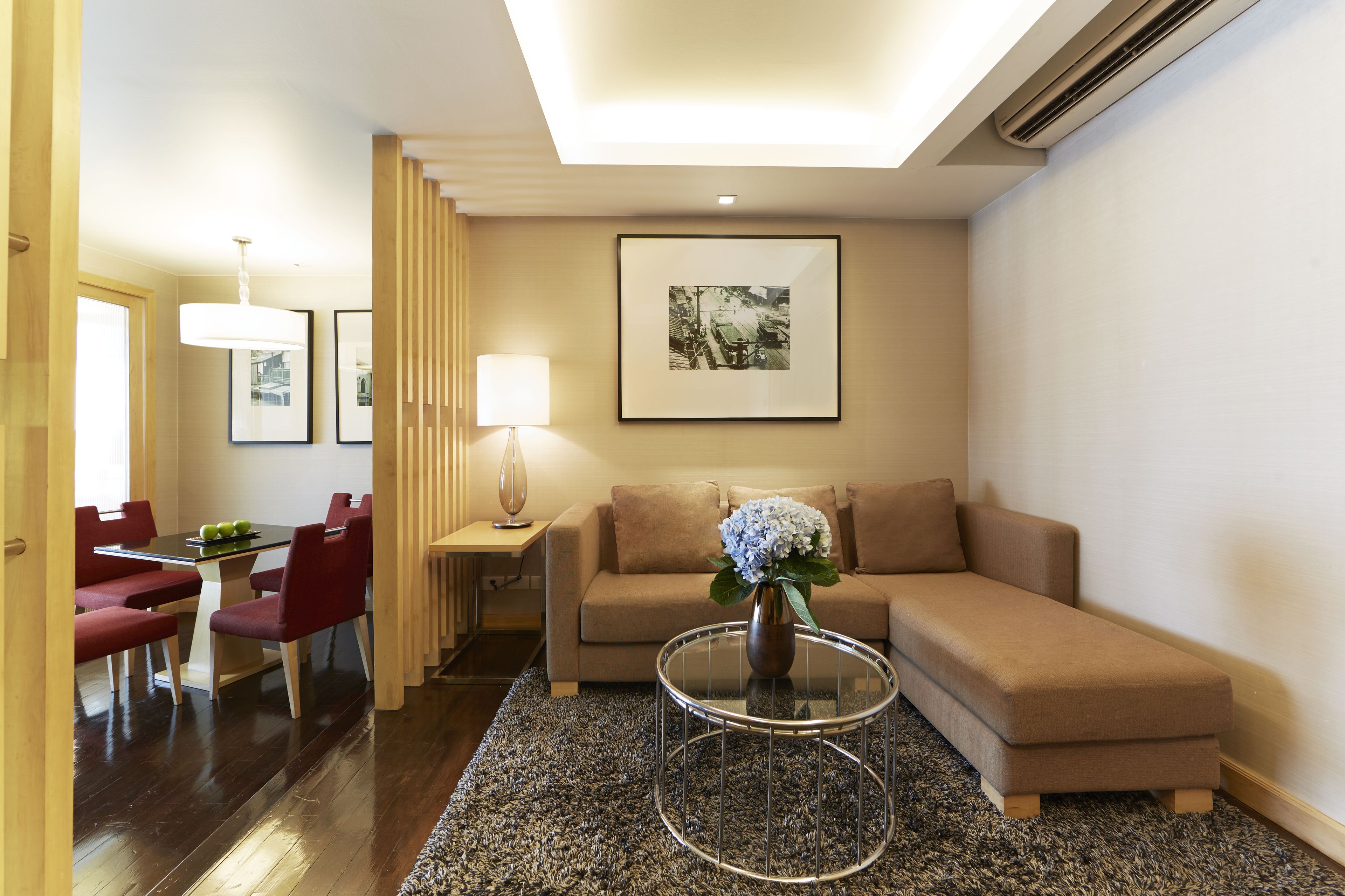 family suite (city view) | living area | 32-inch flat-screen tv with satellite channels, tv, dvd player