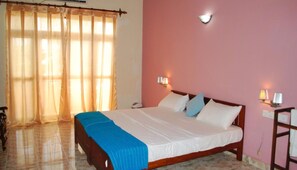 Deluxe Room, River View, Poolside | Desk, soundproofing, rollaway beds, free WiFi