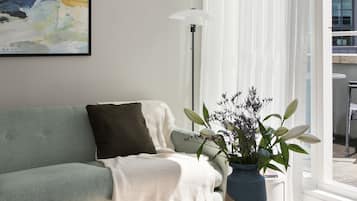 Superior Apartment, 1 Bedroom | Living area | 0-inch flat-screen TV with digital channels, TV