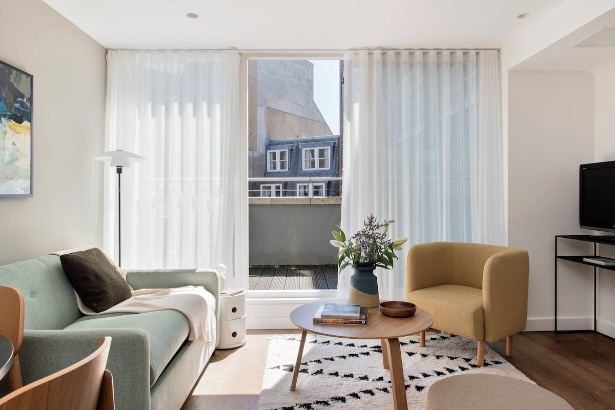 Superior Apartment, 1 Bedroom | Living area | 0-inch flat-screen TV with digital channels, TV