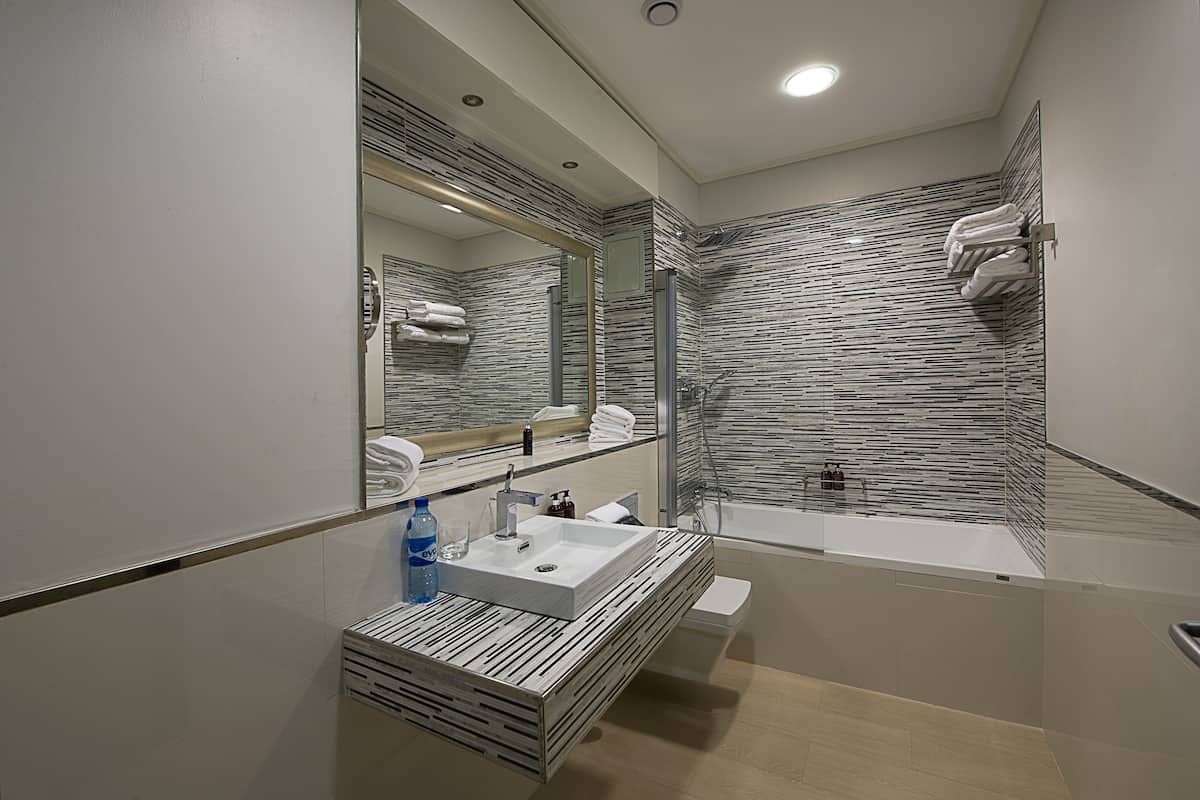 free toiletries, hair dryer, slippers, towels