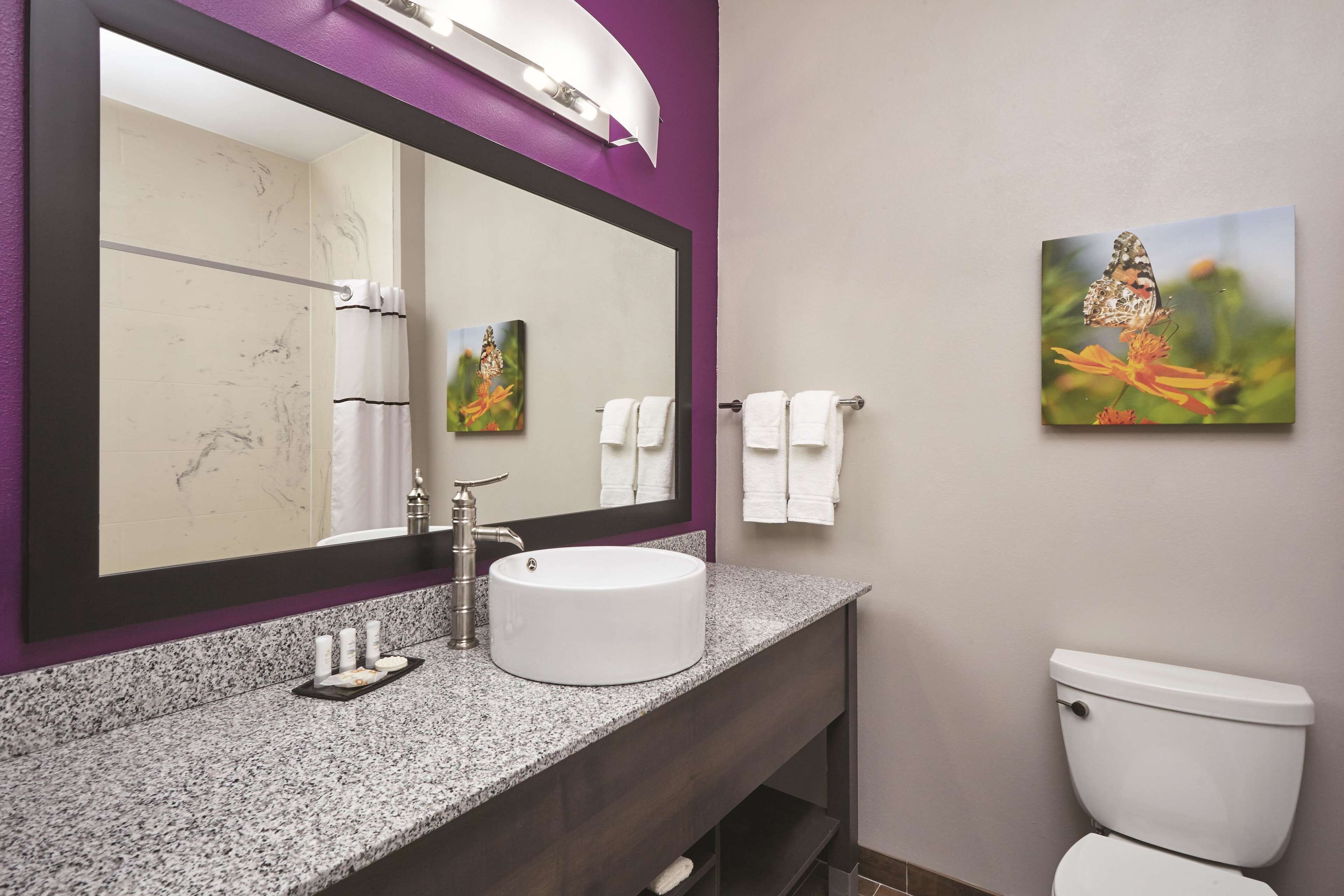 desk, laptop workspace, iron/ironing board, cots/infant beds