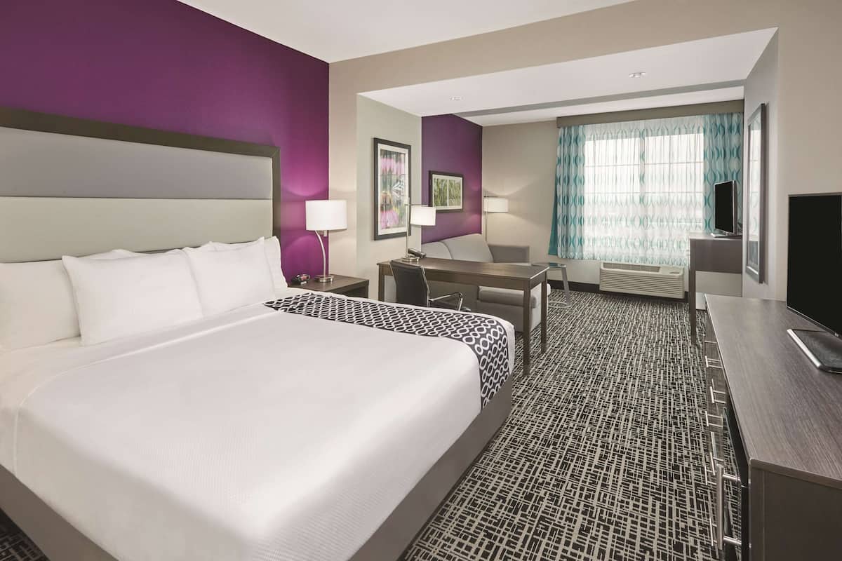 Deluxe Studio Suite, 1 King Bed, Non Smoking (Executive) | Desk, laptop workspace, iron/ironing board, cribs/infant beds