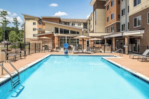 Outdoor pool, open 7:00 AM to 10:00 PM, pool umbrellas, sun loungers