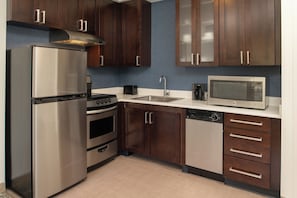 Suite, 1 Bedroom, Non Smoking (Mobility/Hearing Accessible, Tub) | Private kitchen | Full-size fridge, microwave, stovetop, dishwasher