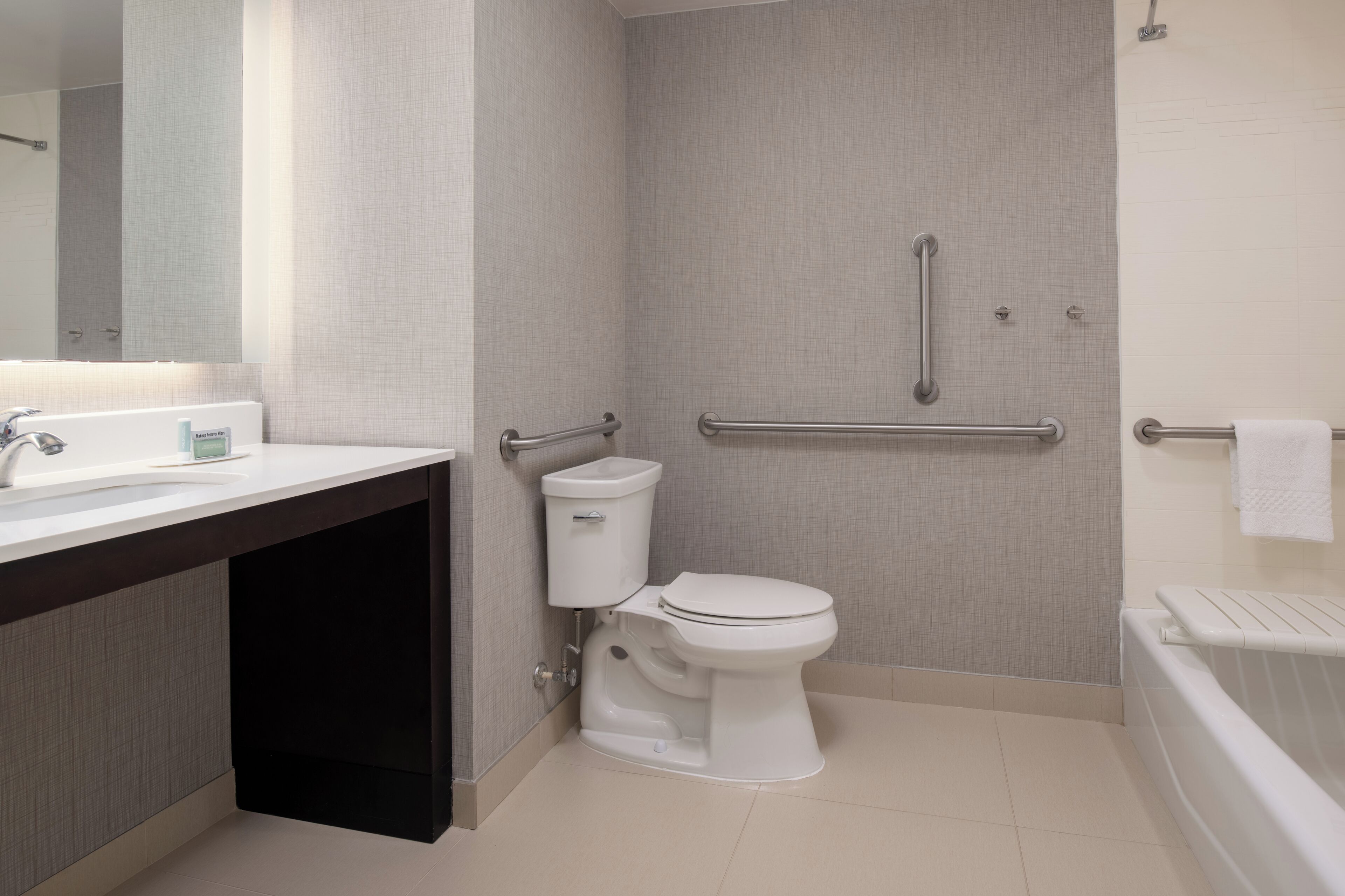 eco-friendly toiletries, hair dryer, towels, soap