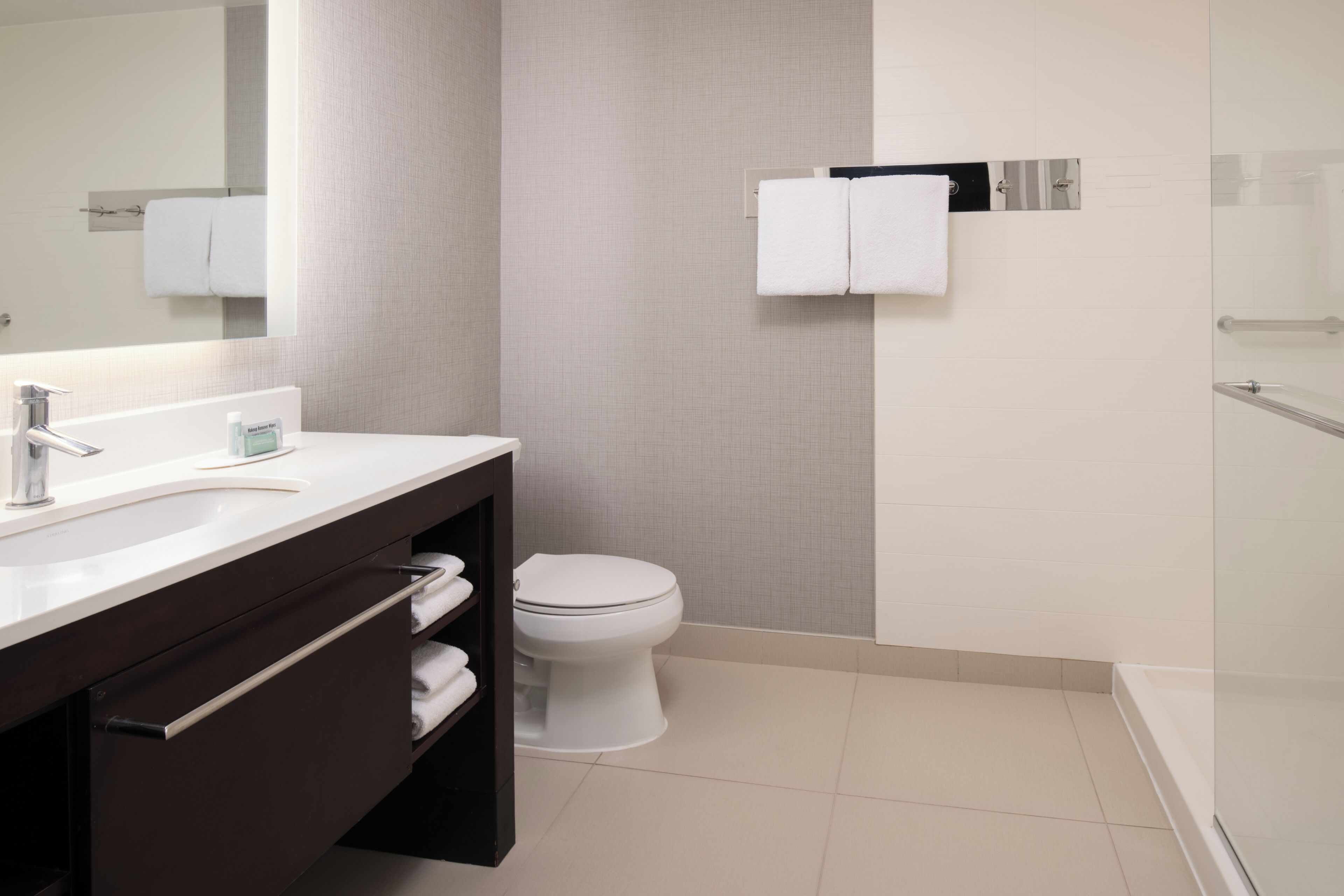 eco-friendly toiletries, hair dryer, towels, soap