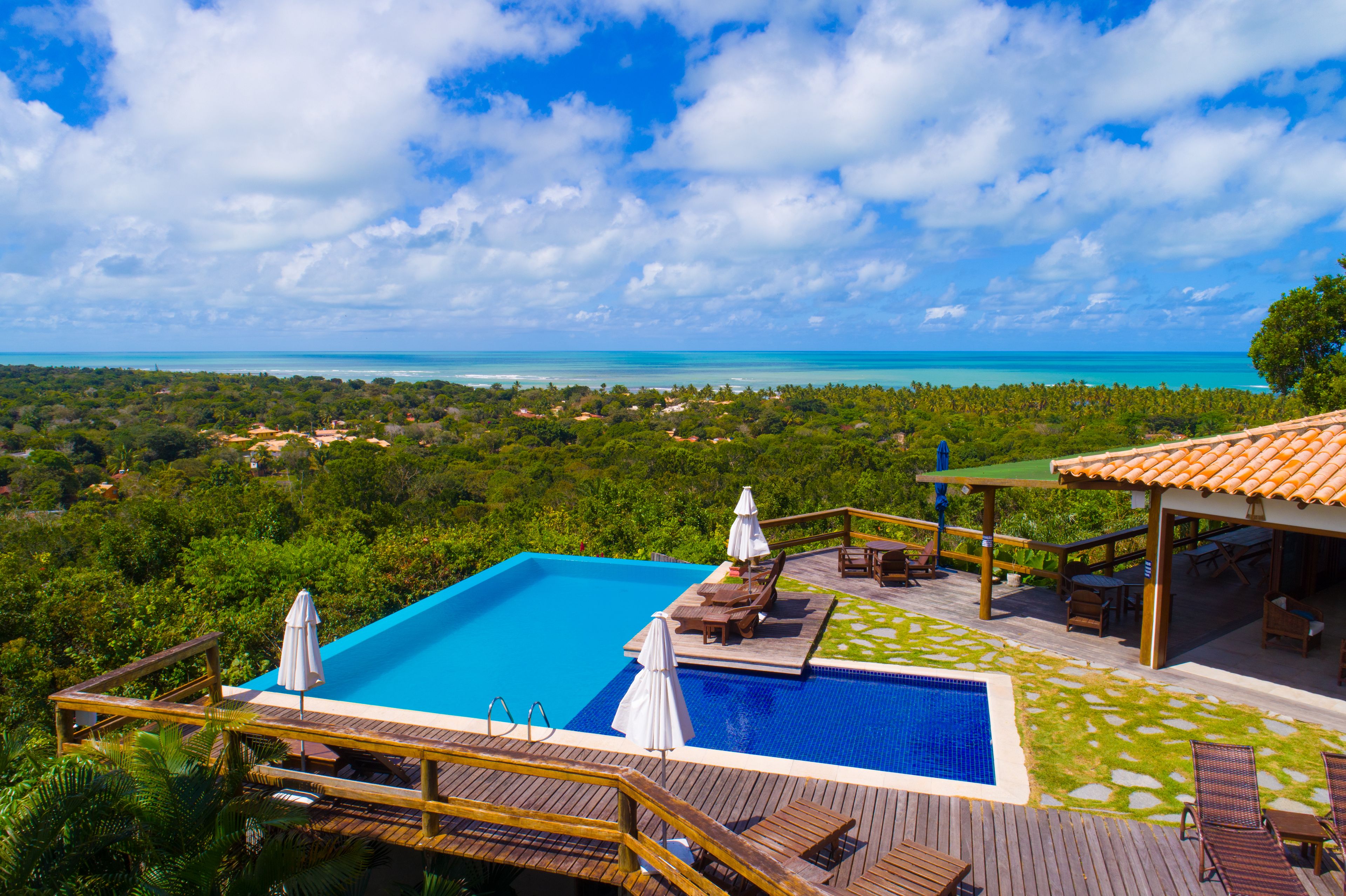 outdoor pool, pool umbrellas, pool loungers