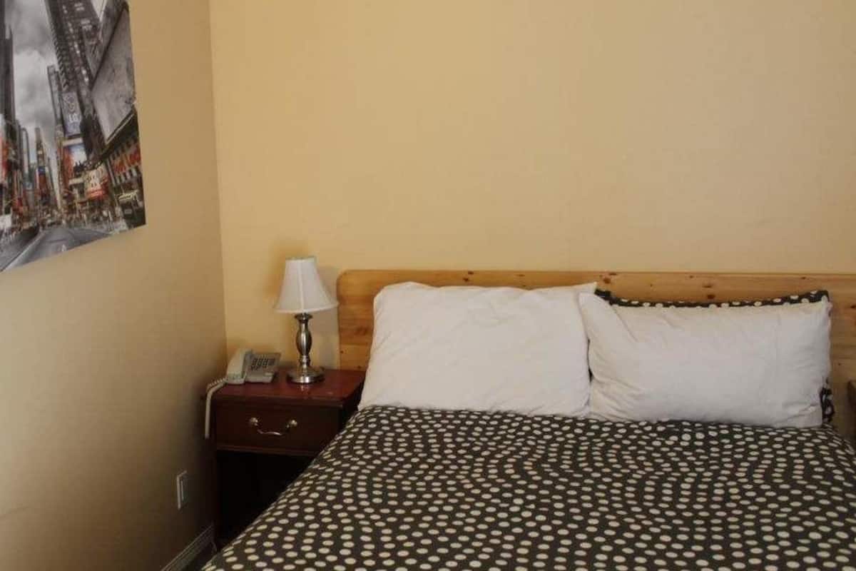 Chambre Deluxe, 2 lits doubles, coin cuisine | Bureau, fer et planche Ă repasser, Wi-Fi gratuit